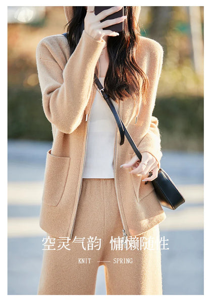 Vibrant display of the Merino wool women's cardigan and pants suit, highlighting its exceptional craftsmanship and contemporary styling.