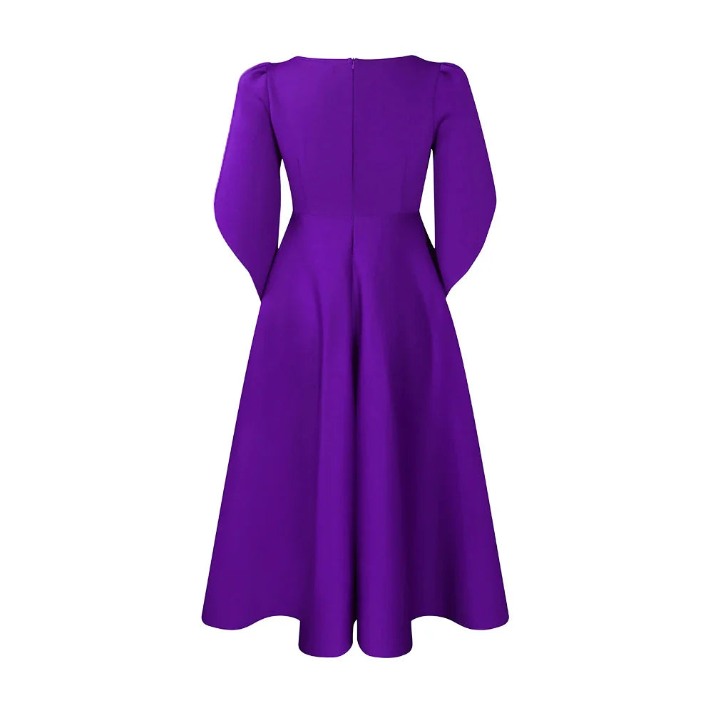 Luxurious pleated dress showcasing a high waist design and flattering silhouette, ideal for special occasions and upscale events.