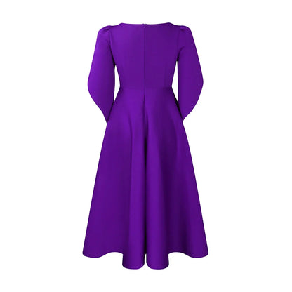 Luxurious pleated dress showcasing a high waist design and flattering silhouette, ideal for special occasions and upscale events.