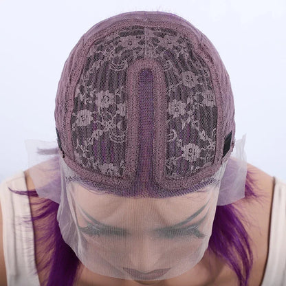 Model wearing a Brazilian purple short straight bob wig, elegantly styled to highlight the natural hairline and transparent lace.