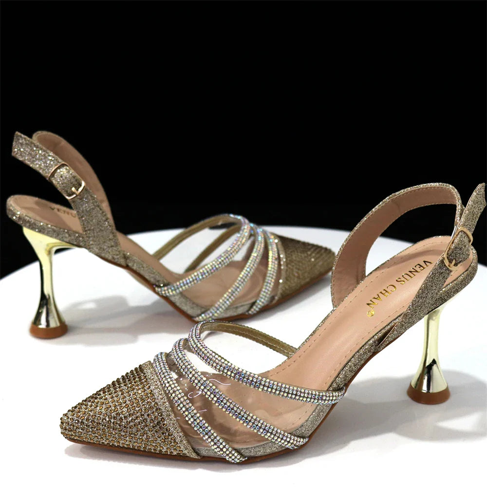 Chic matching black handbag set with a stylish metal handle, designed to complement Venus Chan's pointed toe heels, ideal for special occasions.