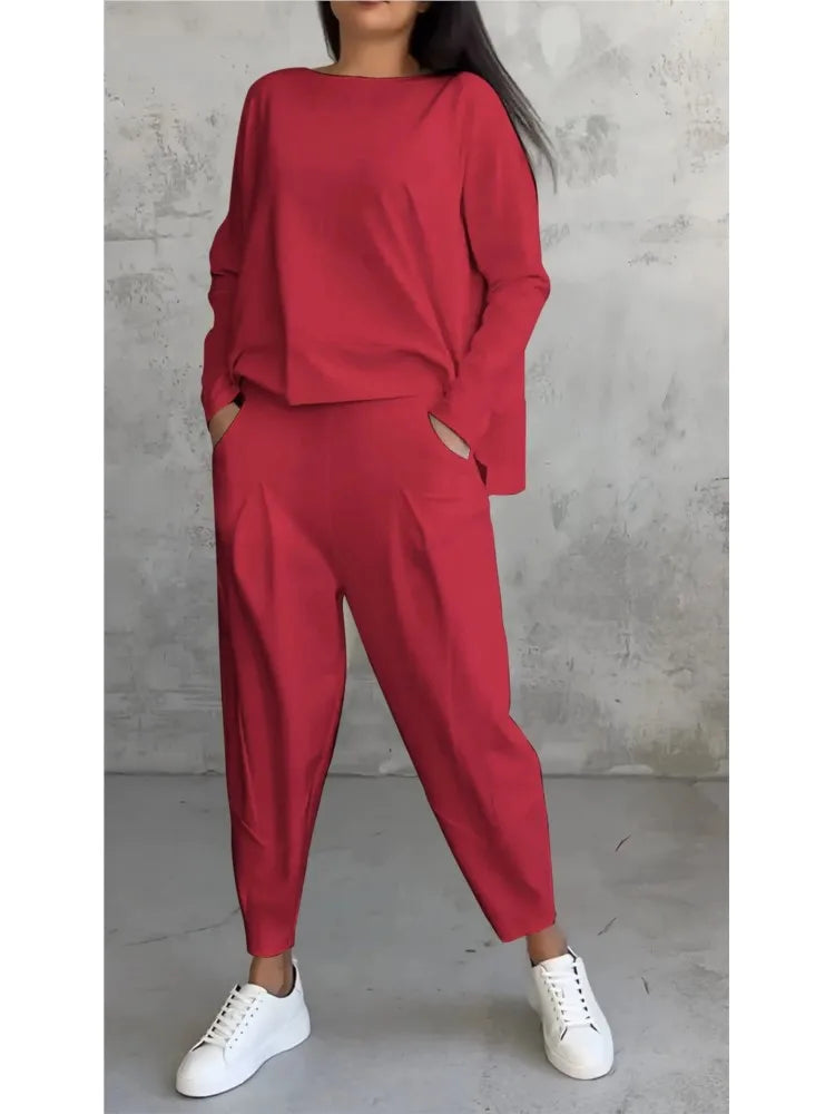 Elegant women's casual sports set featuring a luxurious long sleeve irregular top and high waist harem pants, perfect for autumn and winter outings.