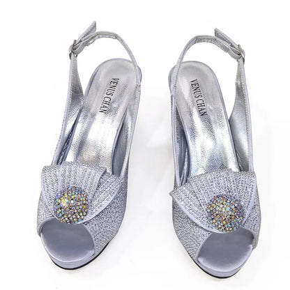 Stylish Venus Chan golden wedding shoes set against a lavish backdrop, emphasizing elegance and luxury.