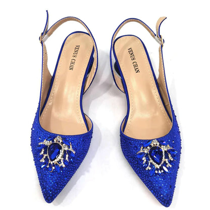 Chic metal handle bag paired with exquisite champagne sandals for women's elegant occasions, showcasing luxury style.