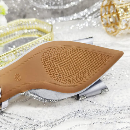 Elegant high-heeled African party sandals for women with stunning crystal chain decoration and peep toe design, ideal for summer occasions.