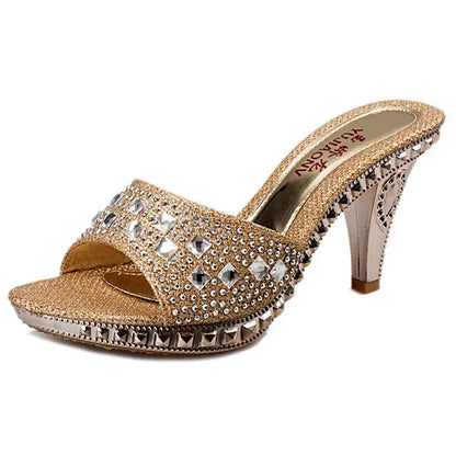 Stylish and sophisticated open back sandals with spike heels, crafted for the modern woman who loves luxury.