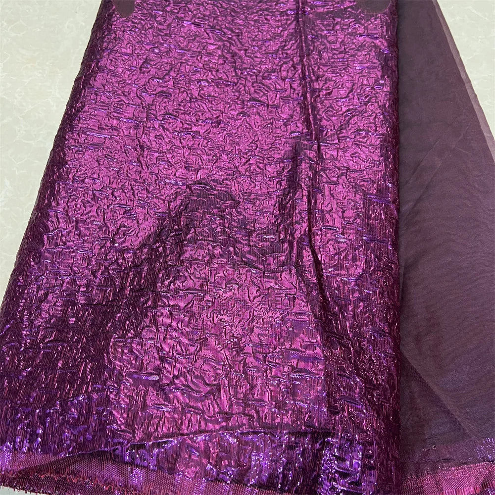 Richly detailed embroidered lace fabric in a fashionable design, perfect for luxurious bridal ceremonies, showcasing elegance and sophistication.