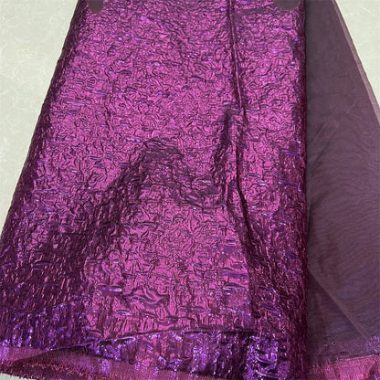 Richly detailed embroidered lace fabric in a fashionable design, perfect for luxurious bridal ceremonies, showcasing elegance and sophistication.