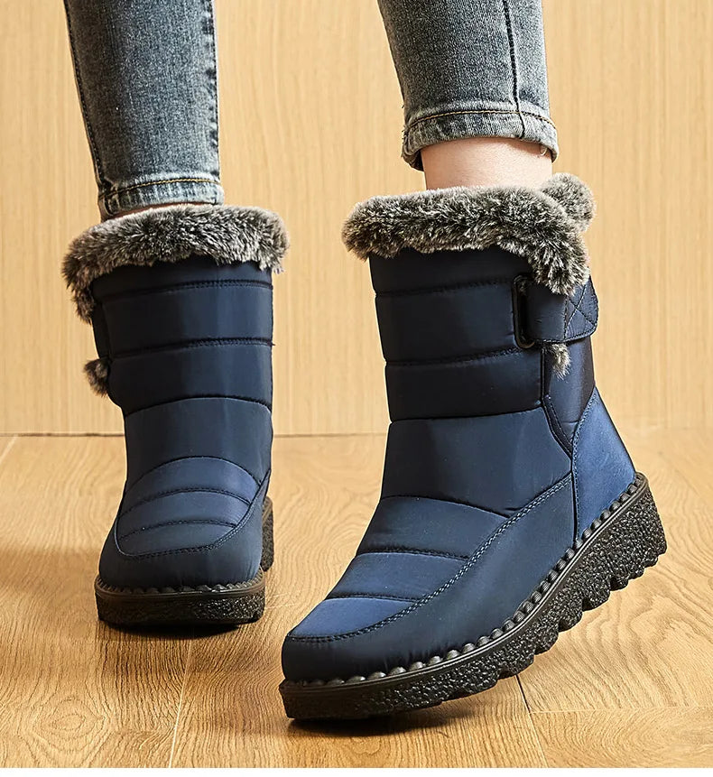 Women's handcrafted low-heeled wedge winter boots adorned with delicate sewing detail, merging practicality with high-end fashion for snowy days.