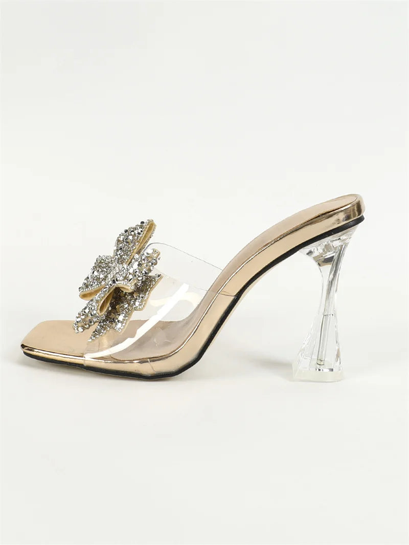Liyke Women's Transparent Slippers featuring an elegant silver butterfly knot, ideal for summer outings.