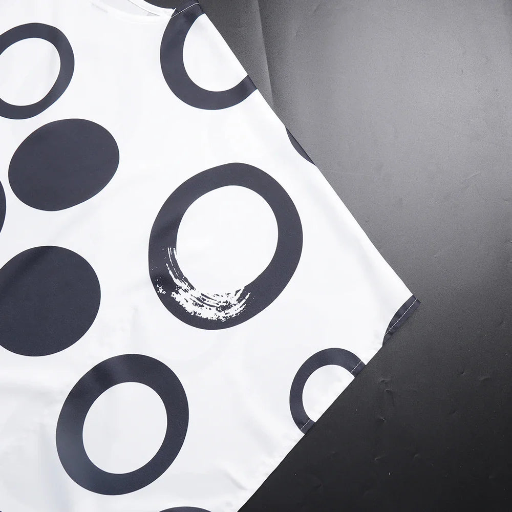 Elegant one-size chiffon abaya in a sophisticated cut, designed for graceful movement at celebrations.