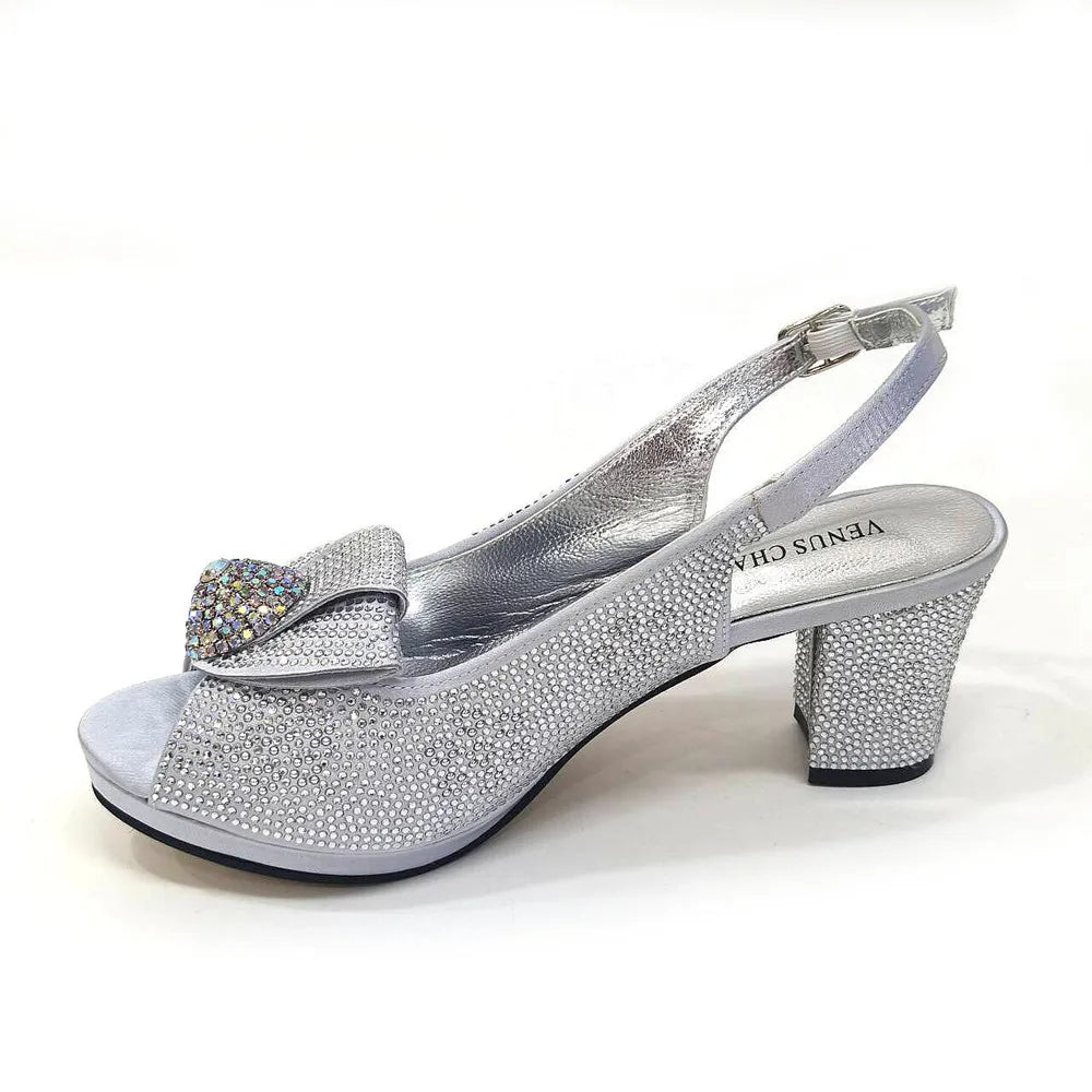 Chic Venus Chan golden wedding shoes paired with an elegant matching bag, perfect for making a statement at any event.