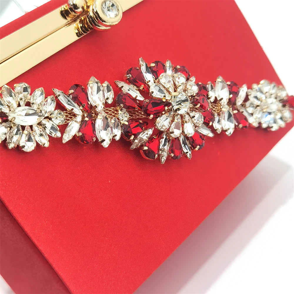 Elegant women's red pointed toe high heel shoes adorned with diamond accents, perfect for formal occasions and parties.