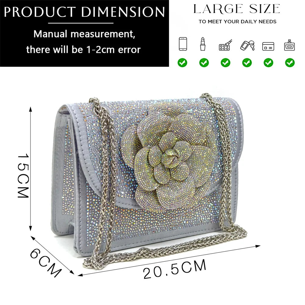 Luxurious matching bag from the women's pump and bag set, featuring a metal handle and long chain strap, adorned with beautiful floral accents and rhinestones.