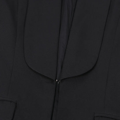 Complete outfit of women's elegant blazer coat and wide leg pants, presented in a luxurious solid colour, perfect for sophisticated autumn/winter fashion.