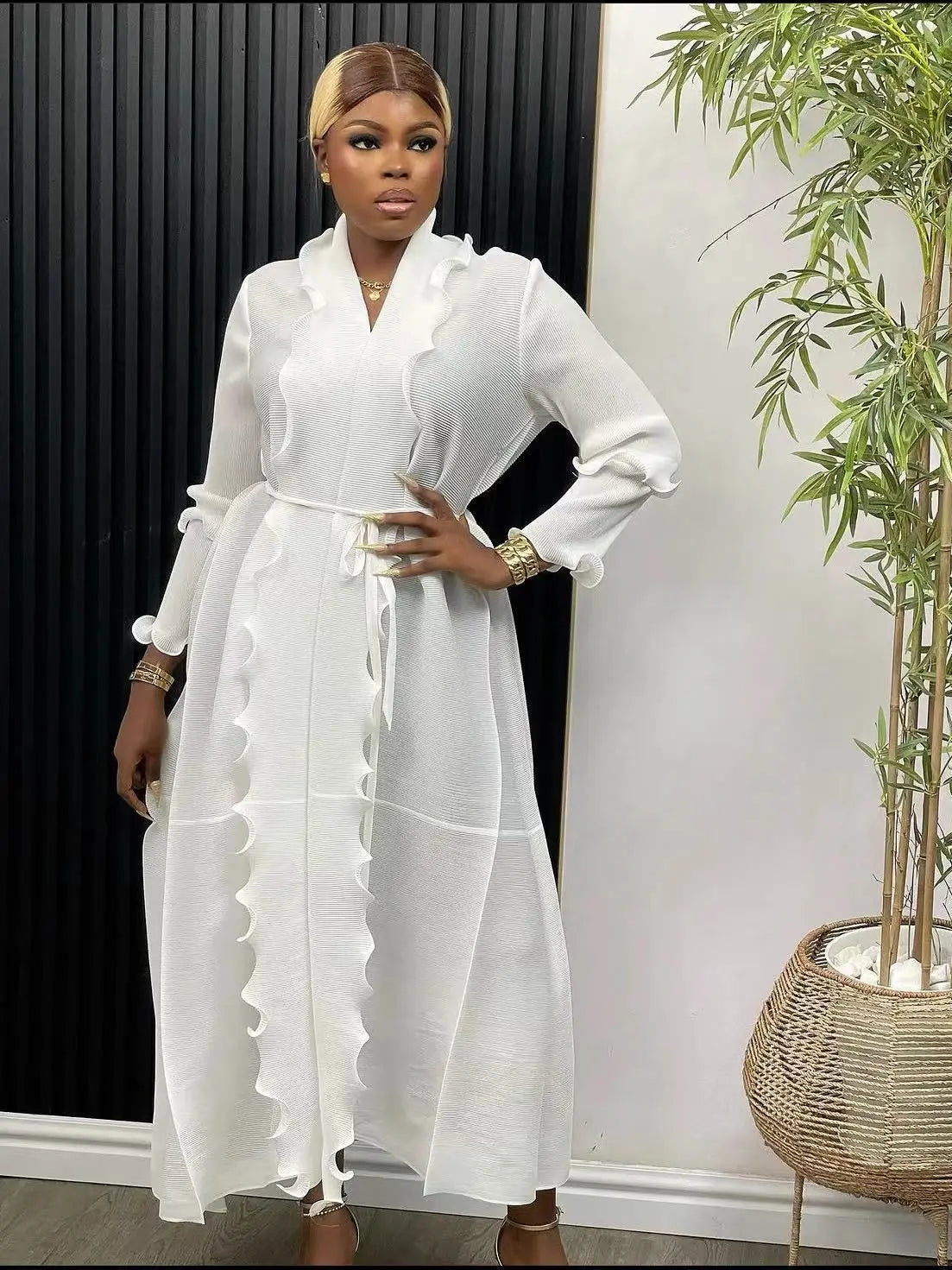 Close-up of ruffle sleeves on a luxury abaya dress, highlighting fine craftsmanship and premium fabric.