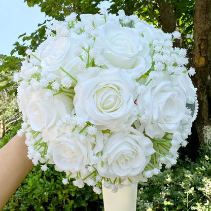 Stunning close-up of a silk wedding bouquet adorned with baby's breath roses and luxurious pearl lace detailing.