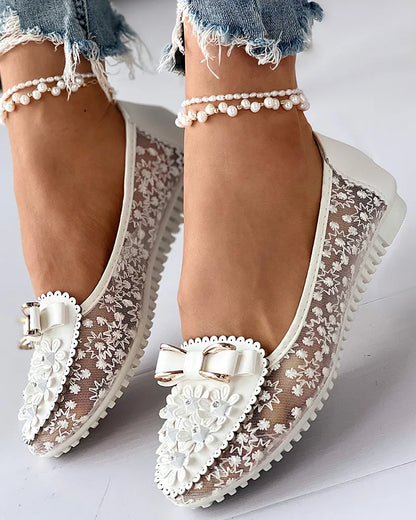 Stylish and breathable floral embroidered loafers designed for women, offering a combination of comfort and sophistication.