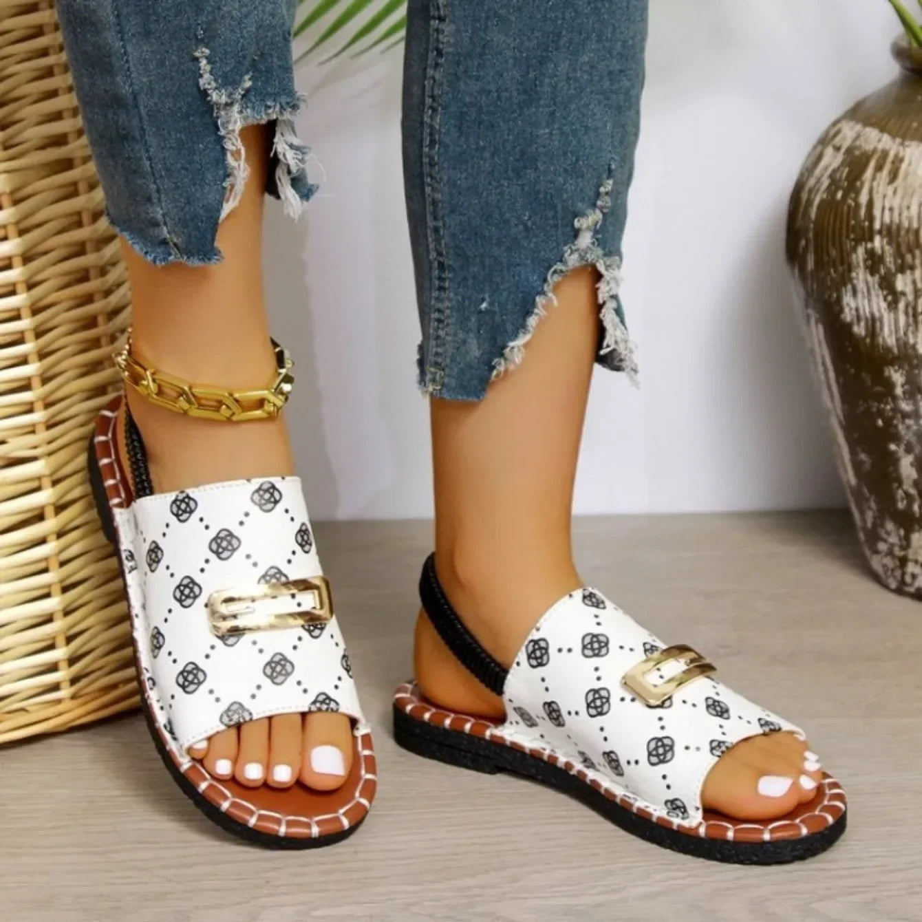 Luxury women's open toe casual flat sandals designed for elegant beach outings, featuring lightweight anti-slip soles and a trendy elastic band closure.