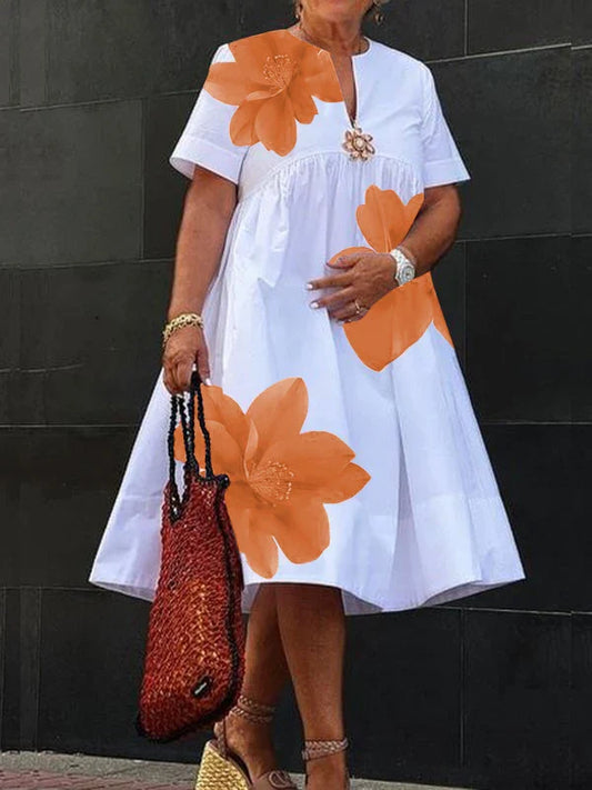 Elegant Modigirl Plus Size Casual Midi Dress for Women featuring a Deep V-Neck floral print, loose A-Line bodice, and short sleeves, perfect for luxurious spring and summer outings.