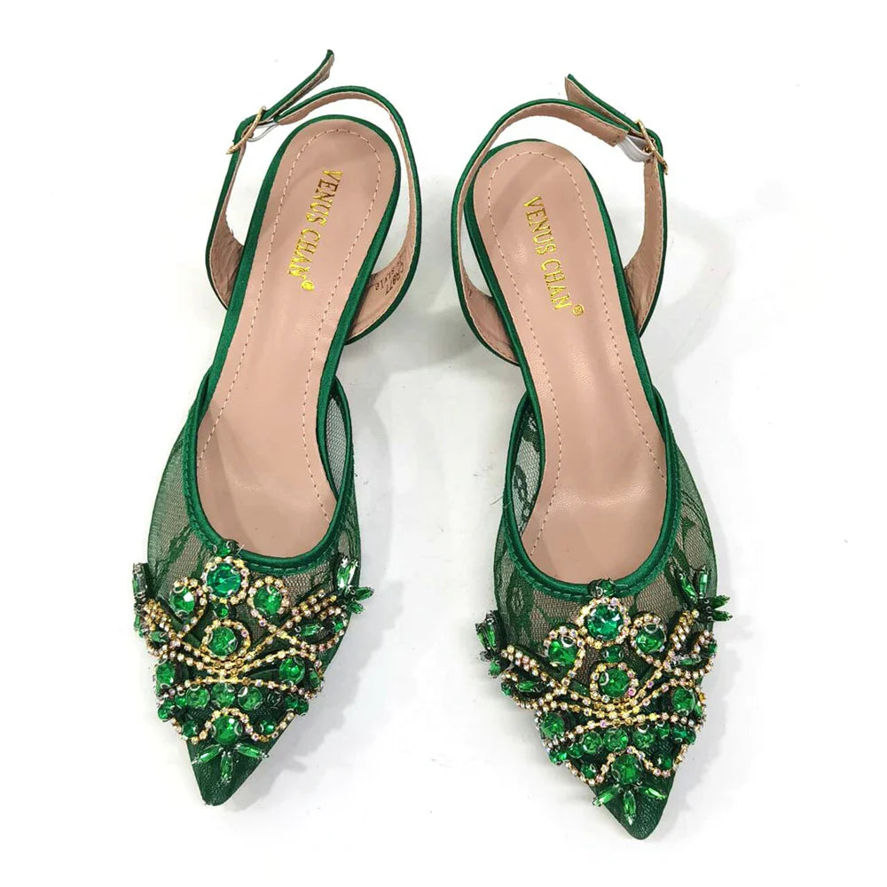 Elegant green lace low heel shoes adorned with crystal detailing, perfect for women's formal occasions.