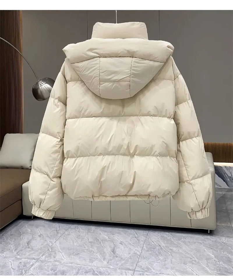 Elegant women's hooded padded parka jacket, showcasing rich thick down cotton material, perfect for autumn and winter streetwear.