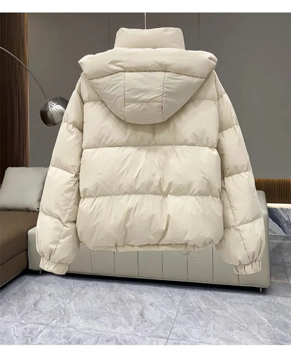 Elegant women's hooded padded parka jacket, showcasing rich thick down cotton material, perfect for autumn and winter streetwear.