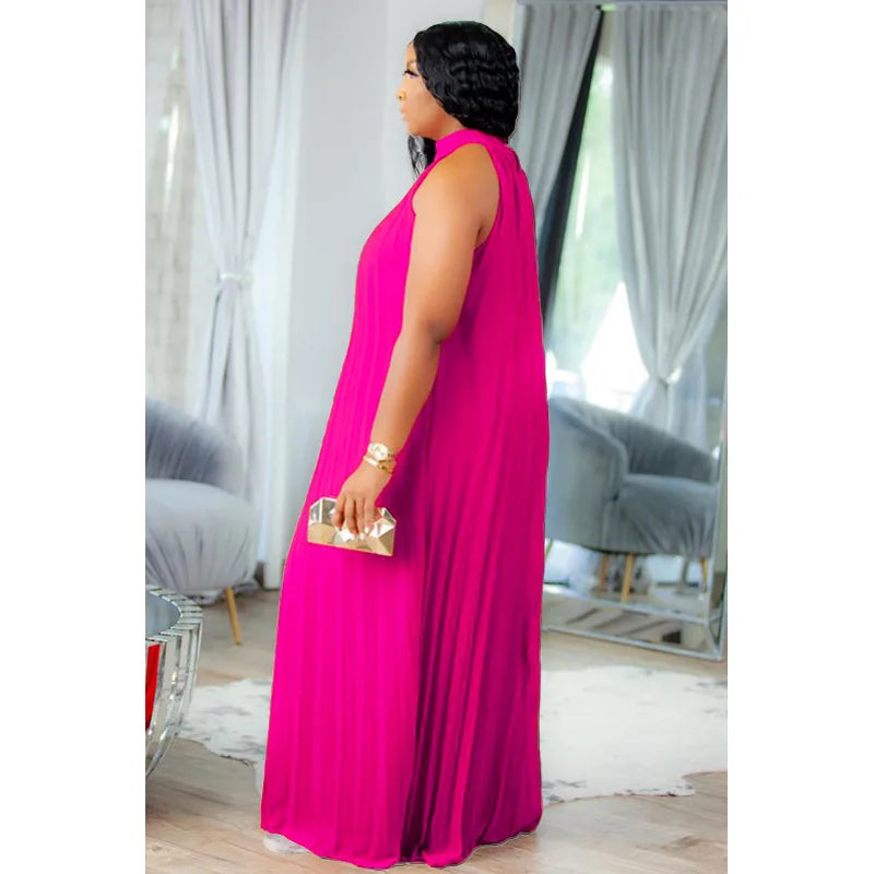 Chic plus size halter maxi dress with a loose pleated design, ideal for elegant night club parties and summer functions.