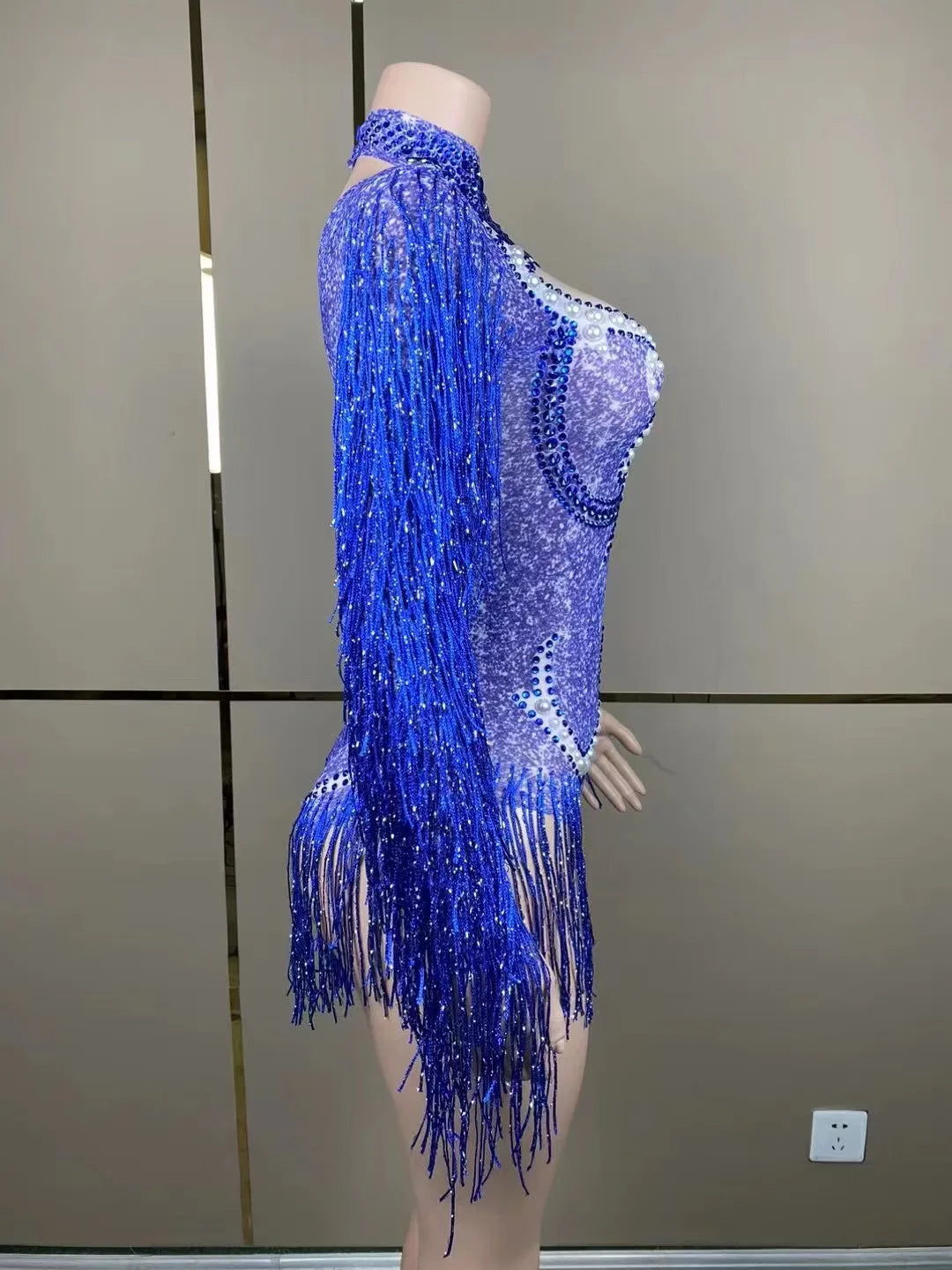Full-length image of the Women’s Cha-Cha Dance Practice Suit showcasing the graceful movement of the fringe skirt during dance performance.