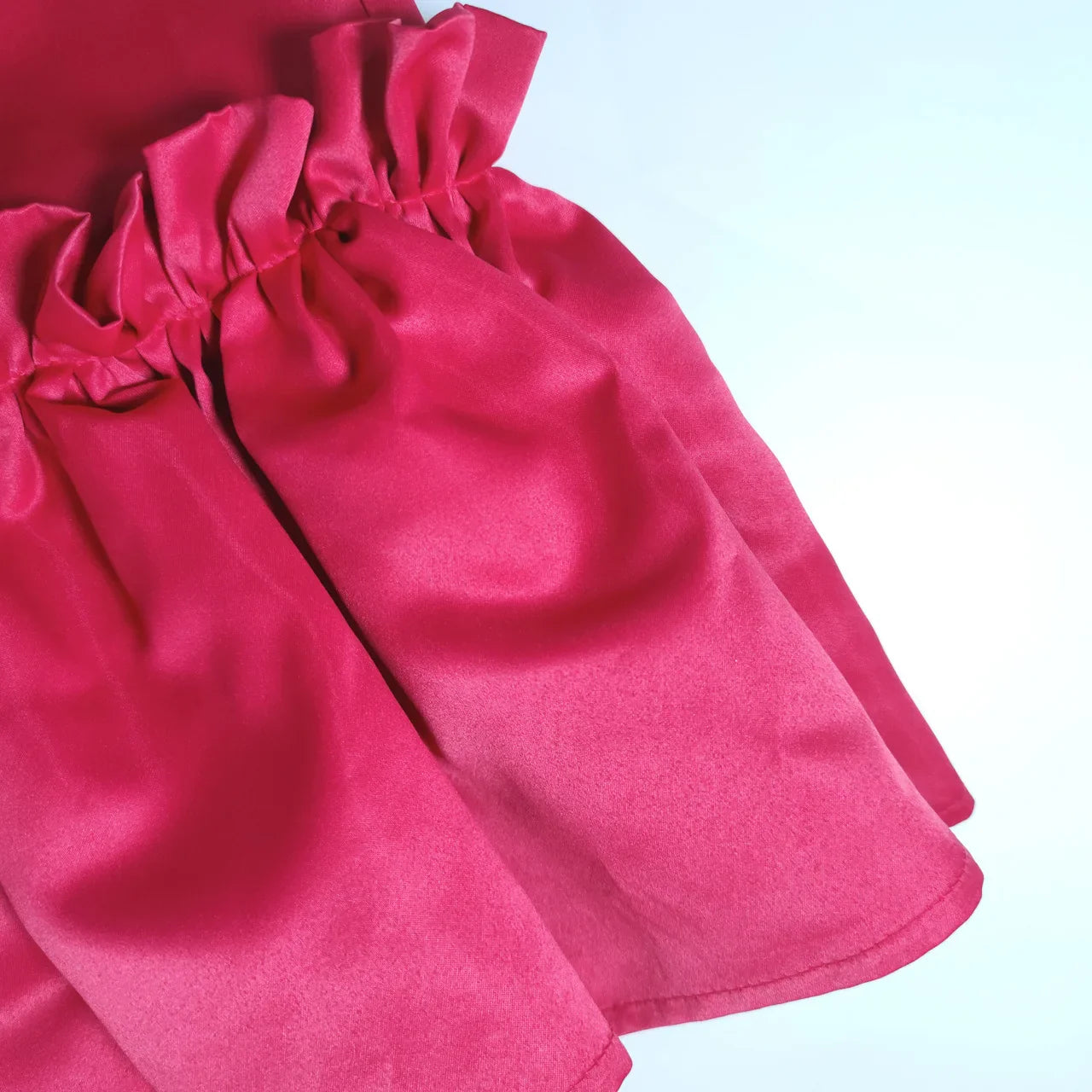 Close-up of the ruffle hem detail on CM.YAYA Women’s Elegant High Waist Wide Leg Flare Pants, highlighting exquisite craftsmanship by Hot Trends Area.