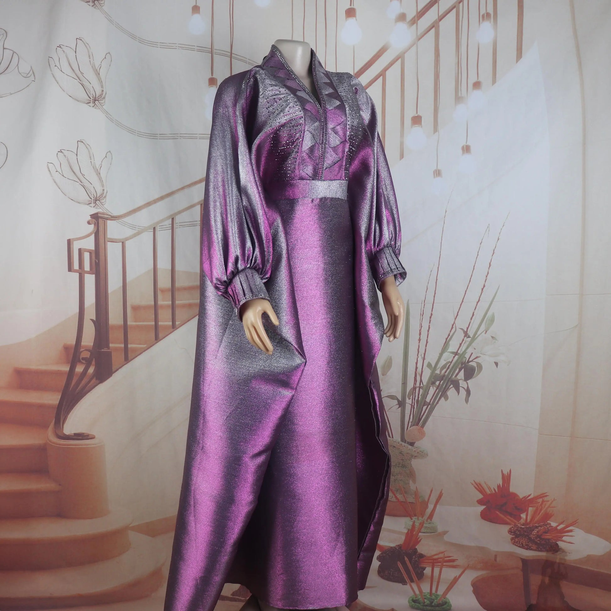 Full-length model shot of a woman wearing a luxury elegant V-neck turkey dress with a traditional African boubou style, ideal for festive occasions.