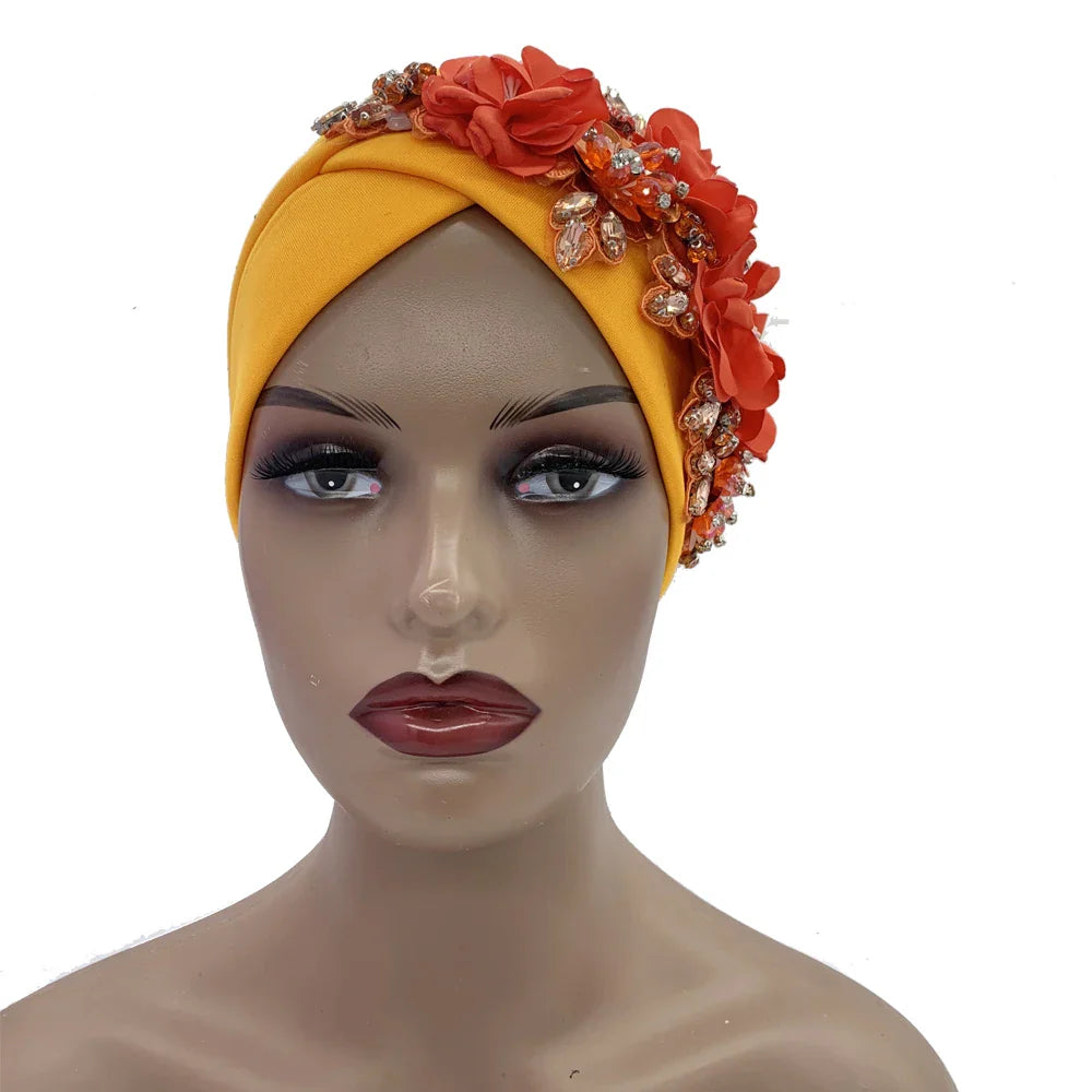 Stylish women's African turban cap featuring dazzling rhinestones, crafted for those who appreciate luxury and elegance in headwear.