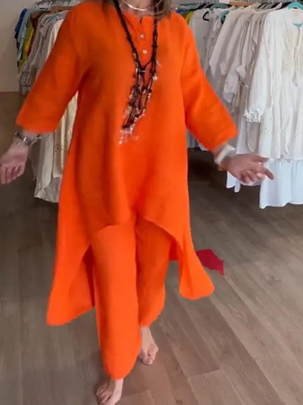 Sophisticated two piece set for plus size women, made of high-quality cotton linen blend, showcasing a flattering O-neck blouse and wide leg pants.