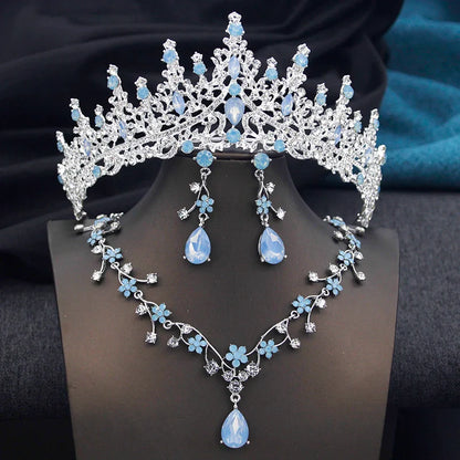 Beautiful opal green jewelry set including crown, necklace, and earrings, embodying elegance for bridal and formal wear.