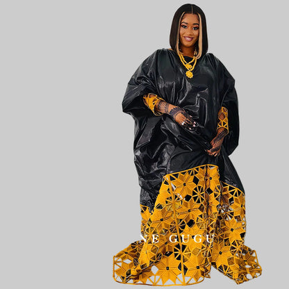 Stylish plus size long sleeve dashiki dress, richly adorned with gold embroidery, ideal for parties and weddings.