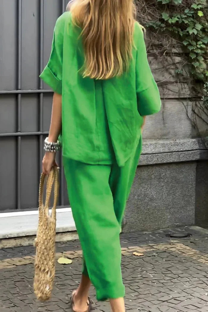 Luxury women's plus-size 2-piece cotton-linen shirt and high-waisted pant suit set, showcasing a sophisticated design ideal for office attire.