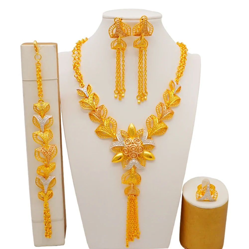 Luxurious gold colour bridal jewelry set for women featuring a stunning necklace, elegant earrings, a graceful bracelet, and a stylish ring, crafted in an exquisite African design.