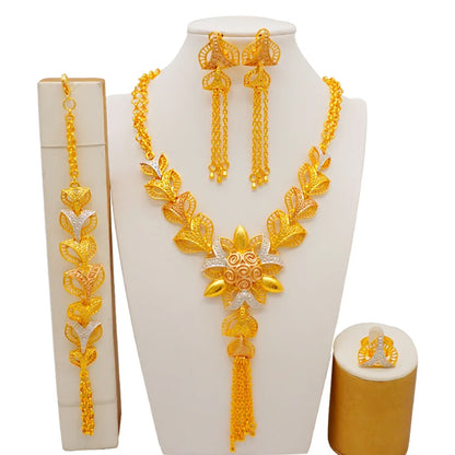 Luxurious gold colour bridal jewelry set for women featuring a stunning necklace, elegant earrings, a graceful bracelet, and a stylish ring, crafted in an exquisite African design.