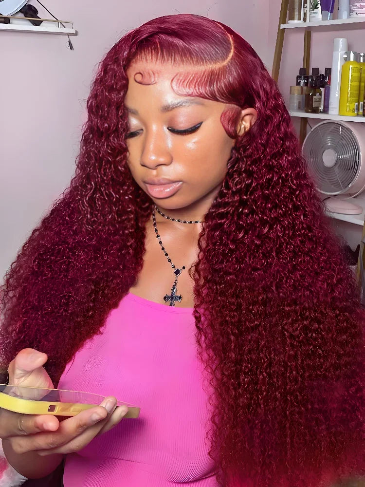 Luxury 30 inch 250% density HD lace frontal wig, featuring exquisite kinky curly texture in a rich 99J burgundy red wine colour, styled elegantly for a flawless look.