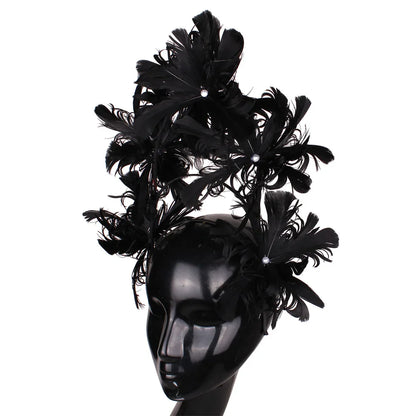 Luxurious blue feather fascinator headband showcasing intricate details, ideal for enhancing bridal hairstyles.