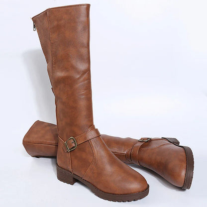 Luxurious mid-calf platform boots crafted from high-quality PU leather, showcasing a contemporary square heel and fashionable buckle accents for an elevated look.