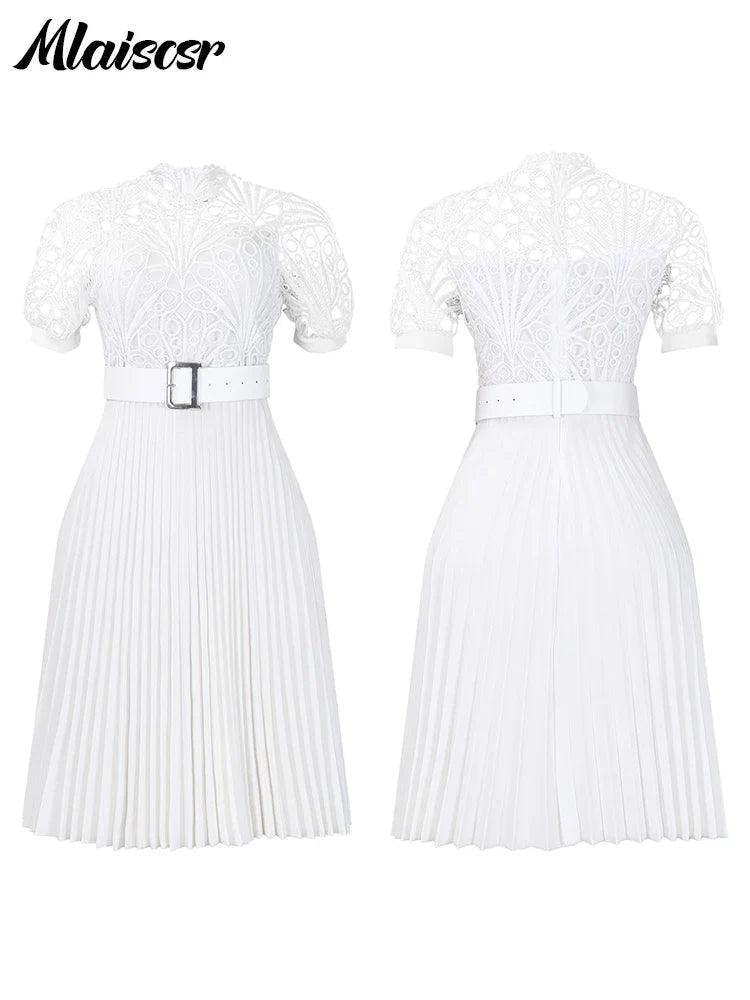 Close-up of delicate lace detailing on the Mlaiscsr Luxury Pleated Dress, showcasing the luxurious craftsmanship.