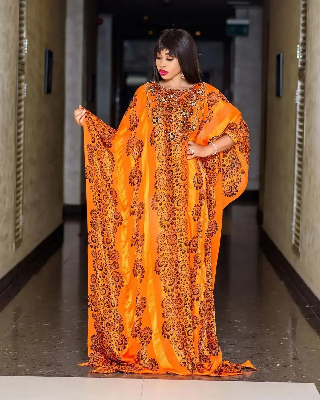 Luxurious African maxi dress for women featuring a sexy long sleeve design, crafted from high-quality polyester, ideal for traditional and modern occasions.