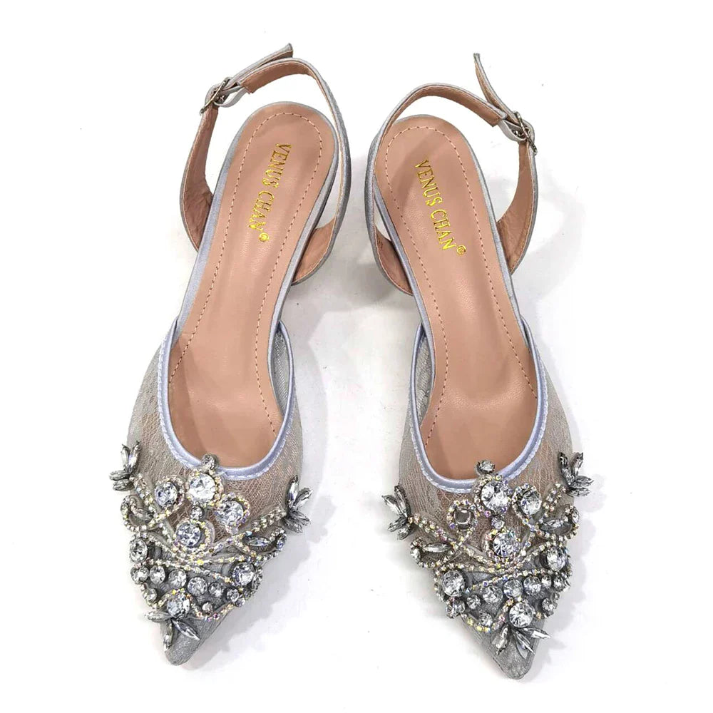 Chic ensemble featuring green lace shoes and matching mini bag, perfect for evening wear and showcasing a graceful silhouette.