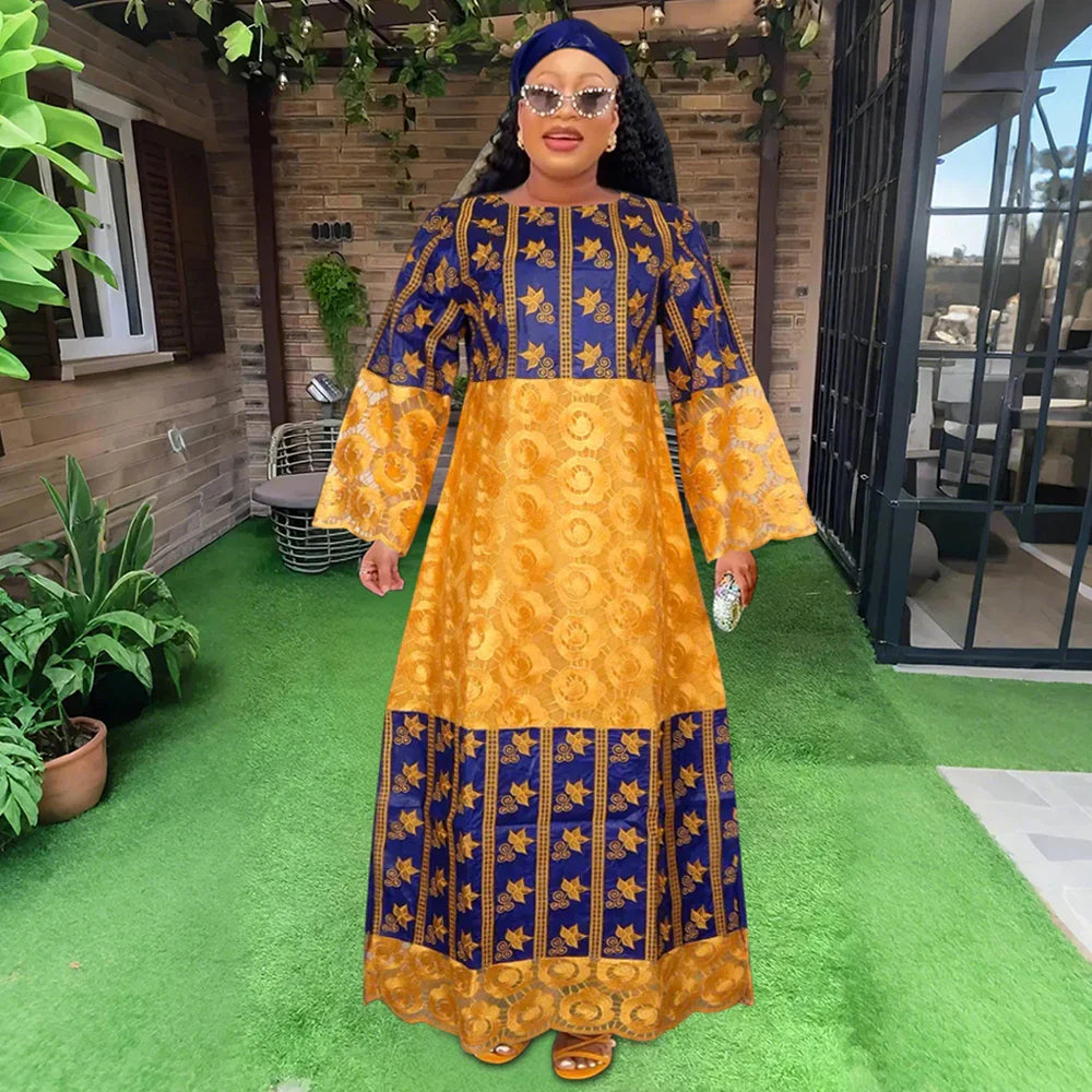 Luxury H&D Women's Bazin Riche African Dress featuring intricate embroidery, perfect for traditional weddings and elegant parties, showcasing exquisite craftsmanship and vibrant cotton fabric.