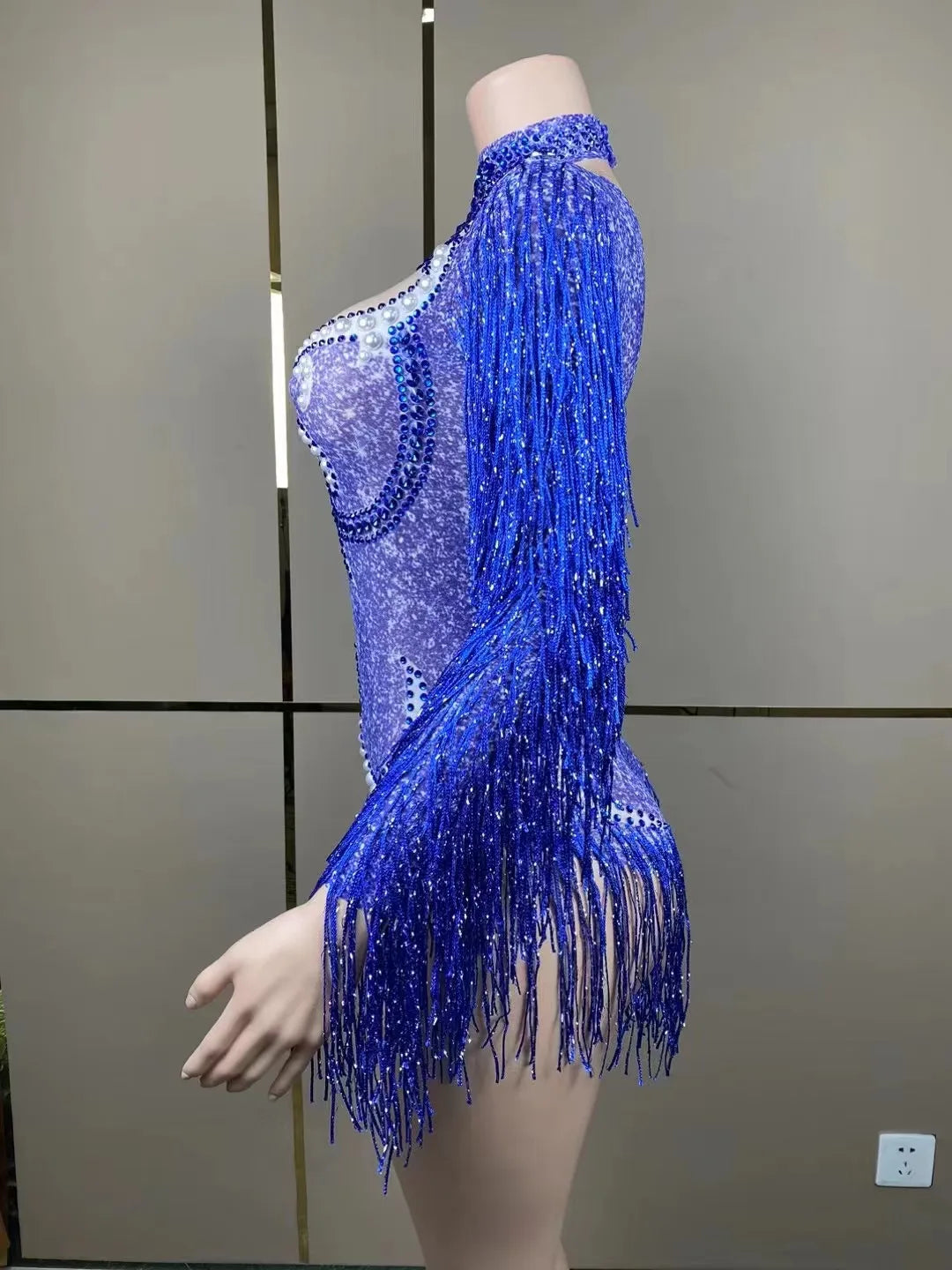 Dancer wearing the Luxury Cha-Cha Dance Practice Suit, demonstrating stylish choreography with a focus on the suit's delicate fringe and fit.