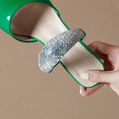 Stylish summer slippers for women, showcasing a chic pointed toe and crystal accents, designed for luxury and comfort.