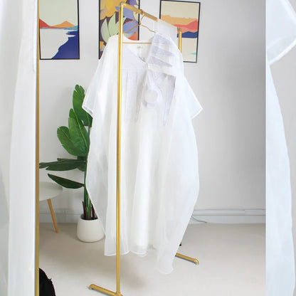 Elegant plus size white embroidered African abaya dress for women, showcasing intricate designs perfect for formal parties and church gatherings.