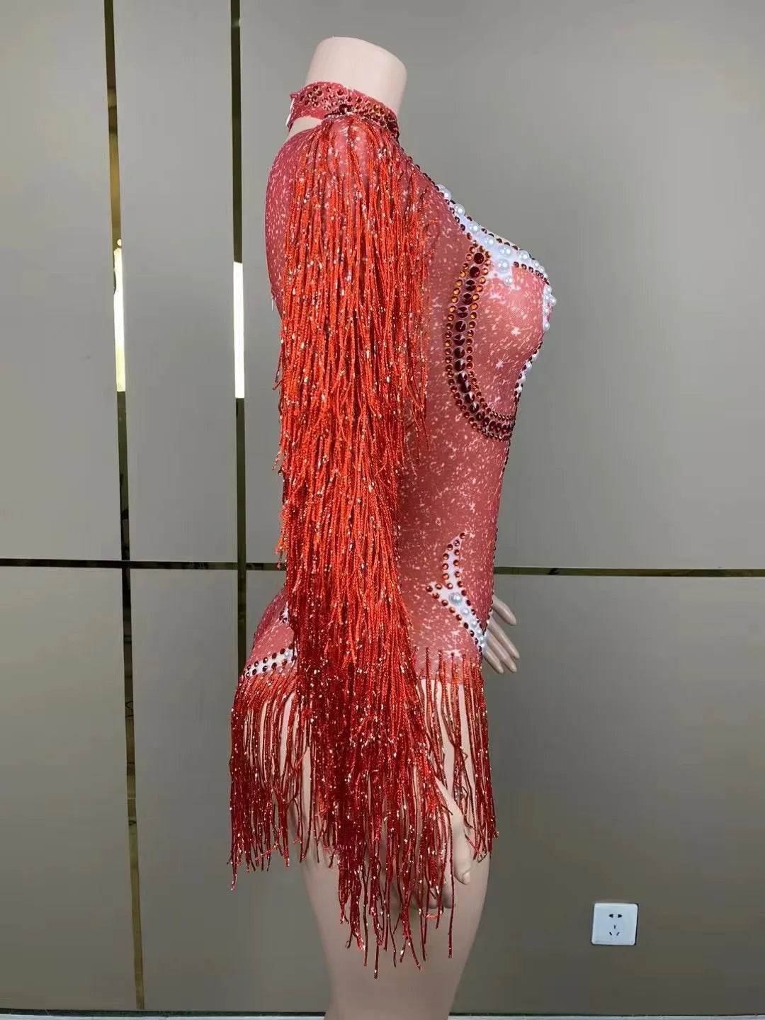 Back view of the luxury women's cha-cha dance practice suit demonstrating the exquisite construction and elegant movement of the fringe skirt.