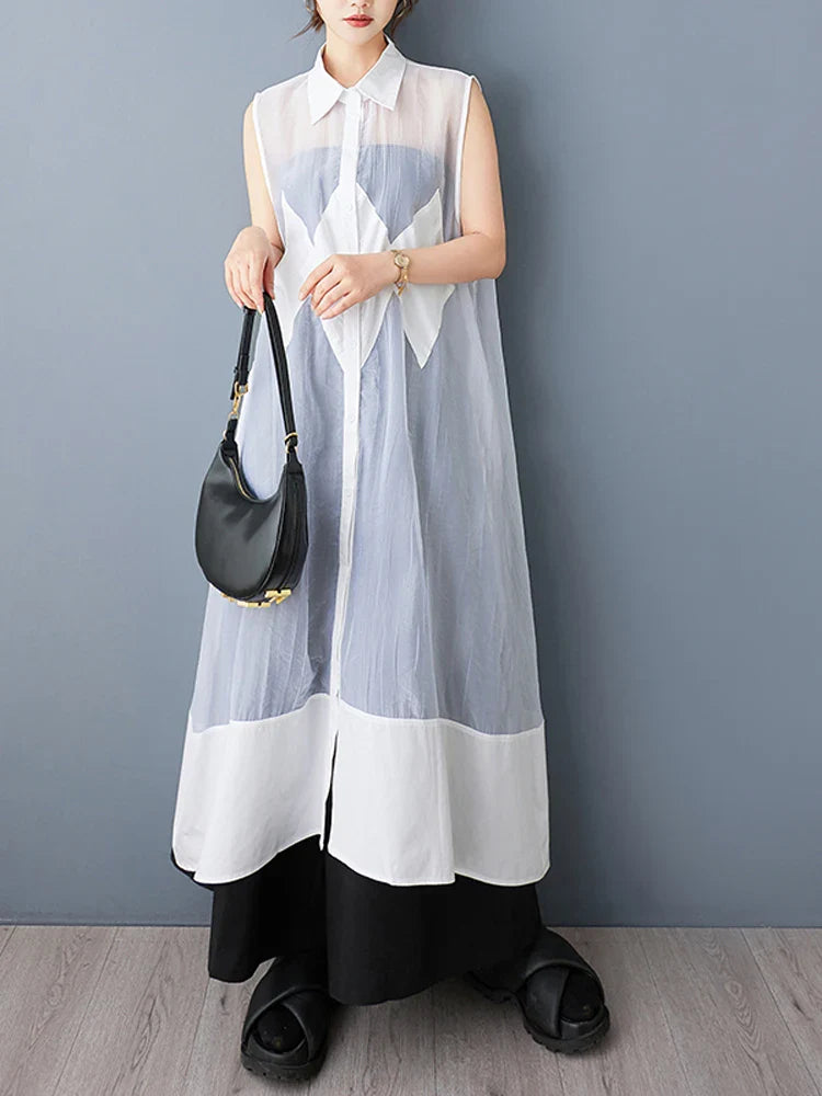 Stylish detail of the NYFS Plus Size Organya Splicing Sleeveless Casual Shirt Dress, featuring a sophisticated O-neck neckline and airy polyester fabric, designed for a comfortable and chic summer look.